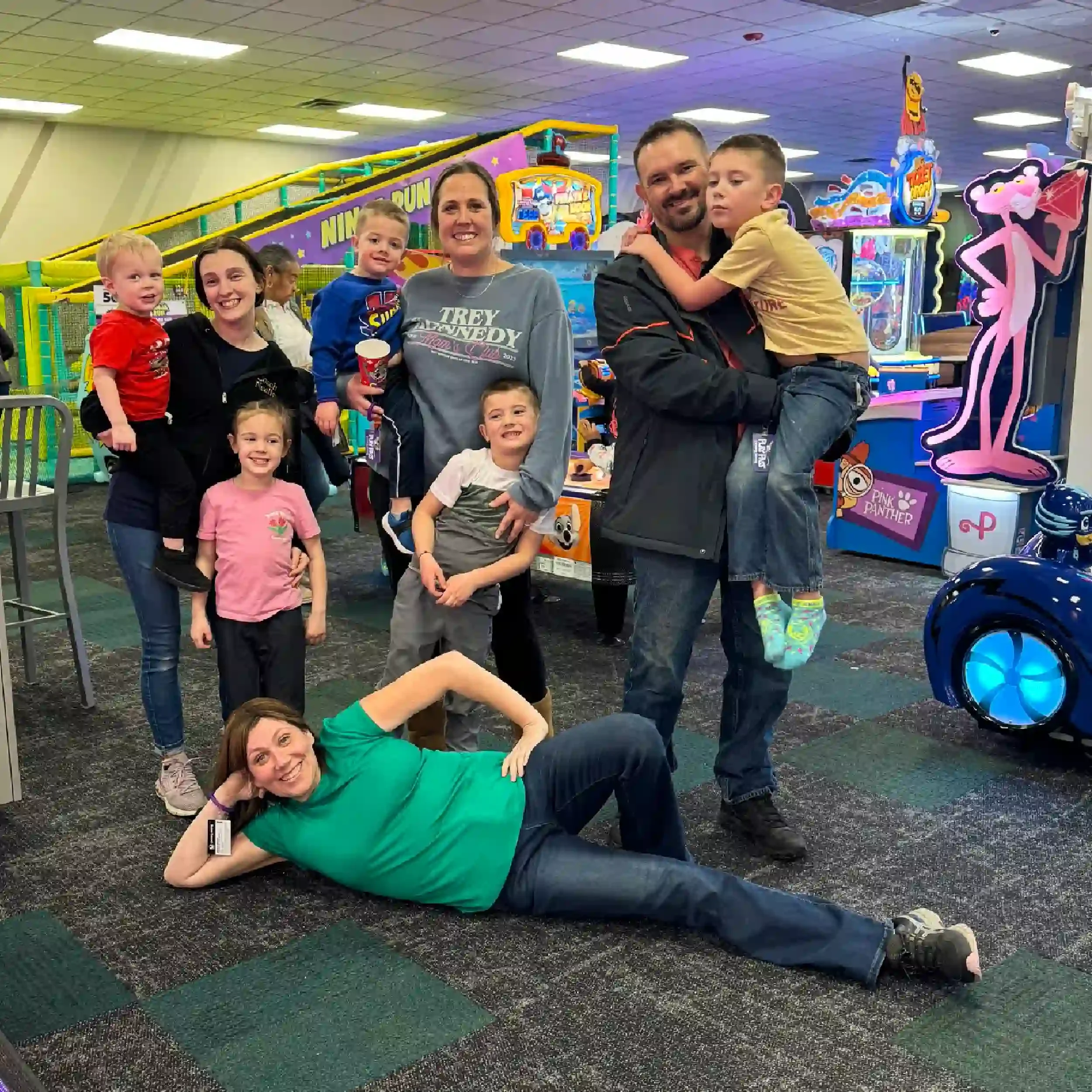 Veterans and kids at an arcade event
